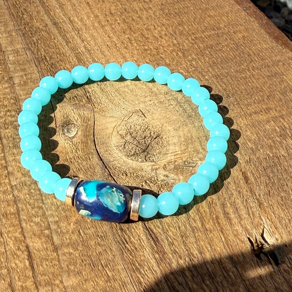 Elegant Blue Moon turquoise and emperor focal bead and Gold Beaded Bracelet